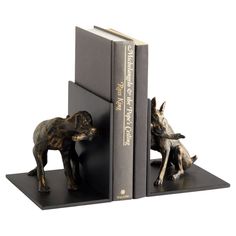 two bookends that are shaped like animals