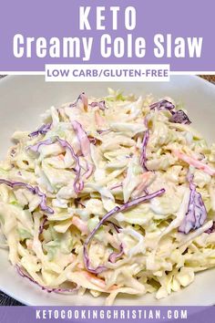 a white bowl filled with coleslaw on top of a wooden table