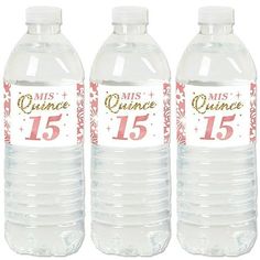 three bottles of water with the number 15 on each one and an orange ribbon around the bottom