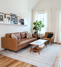 a living room filled with furniture and decor