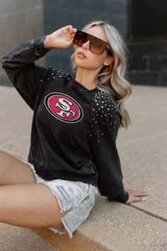 Our vintage studded shoulder washed mid crop pullover is the perfect fashion forward option for any NFL fan. Available in all 32 NFL teams, this pullover is great for game day or everyday wear. It's on trend and stylish, making it the perfect choice for any woman looking to show off her team spirit. With its mid crop length and washed look, this pullover is sure to be a hit. *PLEASE NOTE SIZE CHART FOR DETAILED SIZING. THIS TOP IS A MID CROP FIT AND RUNS SMALL. WE RECOMMEND ONE SIZE UP FOR A TRADITIONAL FIT AND TWO SIZES UP FOR AN OVERSIZED FIT. Seahawks Outfits, 32 Nfl Teams, Nfl Fan, Crop Pullover, Gameday Couture, Nfl Outfits, Nfl Fans, Woman Looking, Seattle Seahawks