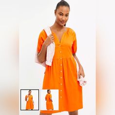 Swing Style With Puff-Sleeve Dress Is Easy-Going With A Polished Finish. Split Neck. Button Front. Short Sleeves With Elasticized Cuffs. New With Tags. 100% Polyester. Maxine Washable Color: Tangerine Orange Puff Sleeve Midi Dress With Buttons For Summer, Summer Midi Dress With Puff Sleeves And Buttons, Casual Midi Dress With Puff Sleeves And Buttons, Puff Sleeve Dress With Button Closure For Day Out, Short Sleeve Dresses With Button Cuffs For Day Out, Orange 3/4 Sleeve Summer Dress, Orange V-neck Dress With Buttons, Casual Orange Button-up Dress, Tangerine Color