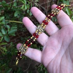 Ruby Red Glass Beads Are A Perfect Pairing With The Gold Calla Lily Beads. Gold Toggle Clasp. Measures 7” All Pieces Are Made With Vintage And Recycled Materials So Flaws Maybe Visible. I Try To Show Any Missing Stones In The Pictures. Please Feel Free To Ask Any Questions. Closures May Be Changed At No Cost. Please Specify What Type Of Closure You Would Prefer At Ordering. Adjustable Beaded Chain Beads For Festive Occasions, Red Bohemian Bracelets With Gold Beads, Adjustable Beaded Chain For Festive Occasions, Gold Beaded Crystal Bracelet For Festivals, Elegant Red Beaded Bracelets For Festival, Red Czech Glass Bracelets With Colorful Beads, Adjustable Red Czech Glass Bracelet, Adjustable Red Czech Glass Bracelets, Elegant Beaded Bracelets With Faceted Beads For Festivals