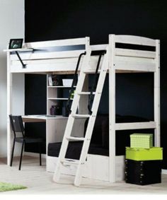 a white bunk bed sitting next to a desk and bookshelf in a room