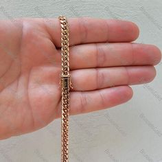 "All Our Jewelry Is MADE OF 100% REAL GOLD  Stand out with this unique Solid 14k Rose Gold  Miami Cuban necklace featuring a box lock clasp with added safety   14K Solid Rose Gold Miami Cuban Chain Necklace, 6.1MM Thick, 22\" 24\" 26\" Inch, Real Gold, Men  Click For All Our ON SALE items https://www.etsy.com/shop/BrusselsGoldNYC?ref=seller-platform-mcnav§ion_id=1  ⭐ ITEM DETAILS:  ► Metal: Rose Gold ► Solid/ Semi-Solid: Solid ► Width: 6mm ► Length: 22\",24\",26\" ► Closure: Box  6 mm 22\" - 60 gram 24\" - 65 gram 26\" - 70 gram  ⭐ SHIPPING: ► ALL OUR JEWELRY ARE SHIPPED FROM NEW YORK CITY ►FREE SHIPPING on all orders in the US. ► We ship INTERNATIONALLY.  Buyer is responsible for duties and taxes. ► Please send us a contact number for international orders  ⭐ RETURN & EXCHANGE: ► No Hassle Luxury Rose Gold Cuban Link Chain Necklace, Luxury Tarnish Resistant Rose Gold Chain Necklace, Luxury Rose Gold Necklace With Curb Chain, Luxury 14k Gold Cuban Link Necklace With Box Chain, Luxury Gold Cuban Link Necklace For Formal Occasions, Luxury Gold Cuban Link Necklace For Formal Events, Luxury Rose Gold Cuban Link Necklace, Luxury Cuban Link Round Necklace Formal, Luxury Cuban Link Necklace With Polished Finish As Gift