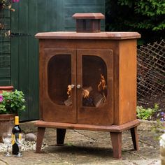 Fireplace in a garden Outdoor Wood Burner, Garden Fireplace, Outside Seating Area, Period Living, Patio Fireplace, Mesh Door, Wood Burning Fires