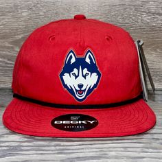 Our 3d Pvc Patch Is A Waterproof, Rugged, And Clean Looking Design. You Can Bet That This Patch Will Look Vibrant For Years To Come. We Only Use The Highest Quality Products And Headwear. We Believe That Our Pvc Patches Beat Out Any Other Type Of Patch Offered On A Hat. Design: Uconn Huskies Hat: Decky Color: Red/ Black Soft-Structured, Five-Panel, High-Profile 70/30 Cotton/Nylon Adjustable Plastic Snapback Slight Curve, Is Adjustable Either Way Hat Size: 7 - 7 3/4 Red Curved Brim Trucker Hat For Outdoor Activities, Red Baseball Cap Snapback For Outdoor Activities, Red Snapback Baseball Cap For Outdoor Activities, Red Snapback Baseball Cap For Outdoor, Red Snapback Hat For Outdoor Activities, Nike Snapback Baseball Cap For Outdoor, Nike Outdoor Baseball Snapback Hat, Nike Snapback Hat For Outdoor, Sporty Red Trucker Hat For Outdoor