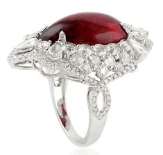 For Sale on 1stDibs - This stunning statement ring has been crafted from 14-karat gold. It is set in 13.65 carats Rubelite and 2.14 carats glimmering diamonds. The ring is a Luxury Pear-shaped Ruby Ring, Luxury Pear-shaped Ruby Ring For Formal Occasions, Luxury Pear-shaped Ruby Wedding Ring, The Ring, Cocktail Ring, Cocktail Rings, Statement Ring, Statement Rings, Diamonds