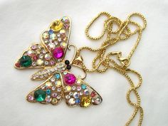 My goal is for you to be pleased with your purchase, and to earn your 5-star feedback Should you have any concerns about your item, please email and I will correct the situation. Betsey Johnson multicolor crystal butterfly necklace. This large BUTTERFLY is 2.25" across and 2.5" long. The chain is about 26" long. I have other colors listed. Butterfly lovers will enjoy! New with tags COMBINED SHIPPING: If you would like to buy any additional jewelry items, with free shipping, please add all the it Multicolor Jeweled Rhinestone Necklace Gift, Multicolor Jeweled Rhinestone Necklace For Gift, Crystal Butterfly Necklace, Largest Butterfly, Crystal Butterfly, Necklace Green, Fine Print, Long I, Green Necklace