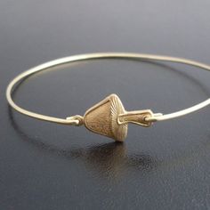 Alice in Wonderland Mushroom Bangle Bracelet  by FrostedWillow, $15.95 Adjustable Brass Charm Bracelet, Mushroom Bracelet, Jewelry Mushroom, Bracelet Stacks, Mushroom Jewelry, Brass Bangle, Bangle Bracelets With Charms, Charm Bangle, Bracelet Bangle