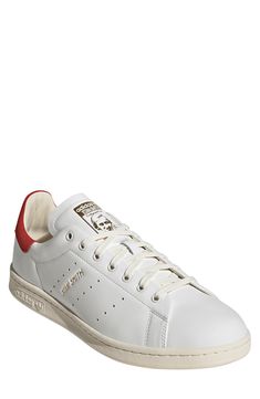 Sleek and smart, this sneaker named for tennis legend Stan Smith features premium leather inside and out plus foil-stamped details for an elevated polish. Pops of color and a grippy rubber tread keep the heritage spirit alive and scoring. Lace-up style Removable insole Leather upper and lining/rubber sole Imported Tennis Legends, Cream White, Up Styles, Mens Shoes Sneakers, Shoes Sneakers, Leather Upper, Color Pop, Men's Shoes, Nordstrom