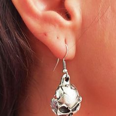 Introducing our Silver Skull Earrings: A daring blend of style and edge. Dangle or hoop they add a touch of mystique to any outfit. Stand out with these unique accessories.• Material: High-Quality Solid 925 Sterling Silver• Finish: Sterling Silver Rose Gold or Gold• A special piece you'll treasure• High-quality materials and attention to detail• Our jewelry is designed With 🖤️ In NY Edgy Nickel-free Skull Earrings, Edgy Skull-shaped Pierced Earrings, Skull-shaped Metal Earrings, Edgy Pierced Skull Jewelry, Metal Skull Single Earring, Silver Cleaner, Earrings Hoops, Unique Accessories, Skull Earrings