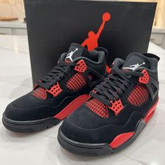 Elevate Your Sneaker Game With The Nike Air Jordan 4 Retro Red Thunder. These Shoes Feature A Classic Mid-Top Design With Lace-Up Closure For A Secure Fit. The Cushioned Insole And Breathable Fabric Lining Provide Comfort, While The Adjustable Features Allow For A Customizable Fit. The Black Colorblock Pattern Adds A Pop Of Color To Any Outfit, And The Iconic Michael Jordan Character Detail Adds A Touch Of Nostalgia. Perfect For Both Activewear And Casual Occasions, These Sneakers Are A Must-Have Addition To Any Shoe Collection. Jordan Character, Jordan 4 Retro Red Thunder, Jordan 4 Red, Red Thunder, Nike Air Jordan 4 Retro, Nike Air Jordan 4, Black Jordans, Jordan 4 Retro, Air Jordan 4 Retro