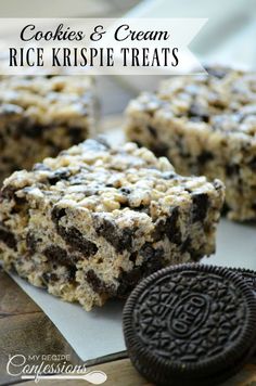 cookies and cream rice krispie treats with oreo cookie on the plate next to it