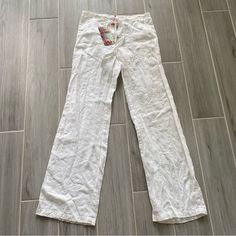 Nwt Johnny Was Wide Leg Embroidered Linen Pants In White Size: Small **Zipper Broken And May Possibly Hav Small Stain Due To Color, But Can Easily Be Washed** 100% Linen Light Breathable Fabric Embroidered Pattern All Over Button, Zip & Drawstring Closure Pockets On Front And Back Gorgeous Summer Staple Measurements Laid Flat: Waist: 13.5” Front Rise: 9” Inseam: 31” Color May Be A Different Tone On Screen Than Real Life Jws1 Casual White Pants With Floral Embroidery, White Casual Pants With Floral Embroidery, White Cotton Bottoms With Floral Embroidery, White Cotton Pants With Floral Embroidery, Casual Linen Bottoms With Floral Embroidery, Embroidered Linen Wide-leg Bottoms, Fitted White Embroidered Bottoms, Fitted Embroidered White Pants, Fitted White Embroidered Pants