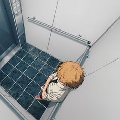 an anime character is sitting on the floor in front of a shower stall with his head down