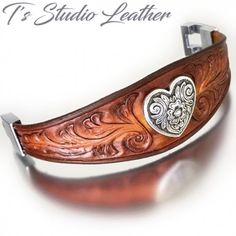 Western Hand Tooled Tool Leather Cuff Bracelet Wristband with Heart Concho Sheridan Style carved floral flowers made in USA America Brown Tan Boho Chic Bohemian Leather Hoop Earrings, Bijoux Fil Aluminium, Leather Jewellery, Leather Cuff Bracelet, Leather Carving, Leather Art, Ostrich Leather, Hand Tooled Leather, Leather Cuffs Bracelet