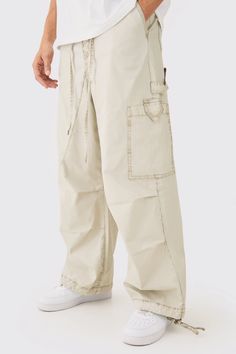 Fixed Waist Overdye Carpenter Parachute Trousers | boohooMAN Beige Parachute Pants Outfit Men, Beige Parachute Pants Outfit, Parachute Pants Outfit Men, Beige Parachute Pants, Oversized Tee Outfit, Parachute Trousers, Plus Size Sequin Dresses, Smart Pants, Mens Cargo Trousers