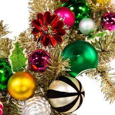 an assortment of christmas ornaments on a white background