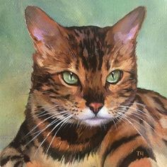 a painting of a cat with green eyes and whiskers on it's fur