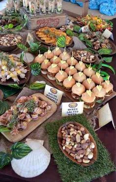 a table topped with lots of food covered in toppings