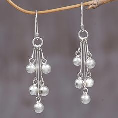 From Indonesian artisan Putu Putri comes this elegant pair of dangle earrings. Featuring a beautiful high polish finish, these simple, attractive earrings are crafted from sterling silver. Hoop Earrings Diy, Bijoux Fil Aluminium, Wire Jewelry Designs, Silver Dangle Earrings