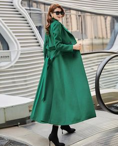 "This woman long wool coat in emerald green is a timeless winter piece that will add a divine pop of color to your winter wardrobe. This coat is a stunning color, lovely length, and keeps me warm. Endlessly versatile, layer it over jeans and sweaters or sleek dresses for countless styling options. FEATURES 50% wool, 50% fiber,nylon Polyester lining Double-breasted button closure Long sleeve Two side pockets Ankle length Perfect for winter, autumn Dry clean More colors select from photo L1 https: Green Single-breasted Wool Coat For Winter, Green Double-breasted Wool Coat For Winter, Double-breasted Green Wool Coat For Winter, Green Long Pea Coat For Fall, Classic Green Wool Coat For Fall, Green Double-breasted Wool Coat For Fall, Classic Long Green Pea Coat, Green Long Coat For Formal Occasions, Formal Green Long Coat