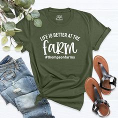 "Farm Shirt, Farmer Shirt, Life Is Better On The Farm, Summer Camp Tee Shirt, Outdoor T-Shirt, Hobby Shirt, Life Shirt, Custom Farm Tee Shirt. HI! Welcome to my store, I'm delighted to see you here. My store's main goal is to provide you with premium everyday apparel with the best graphic t-shirts. I see you as a friend, not just a customer. I'm sure you'll love my designs. You can order the same design 4XL and 5XL large sizes from the link, please specify the details in the order note.   https: Farm Tshirt Design Ideas, Agriculture Shirt Design, Family Farm Shirts Ideas, Life Is Better On The Farm, Farm Shirt Designs, Farm Tshirt Ideas, Cotton Graphic Tee Camp Shirt With Letter Print, Cotton Camp Shirt With Letter Print, Farm Shirt Ideas