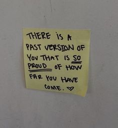 there is a post - it note on the wall that says, there is a past version of you that is so proud of how far you have gone