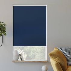 a blue roller blind in a living room