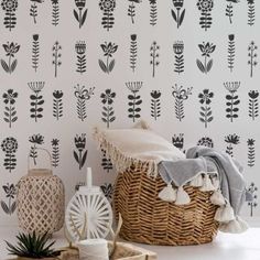 the wallpaper is decorated with black and white flowers