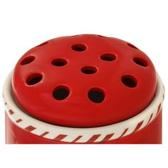 a red and white container with holes in it