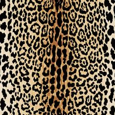 an animal print pattern with black and brown spots on the fur, as if it is in