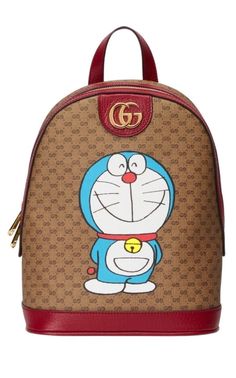 Doraemon small backpackSingle flat top handleTwo-way zip fasteningGold-tone logo plaqueGraphic printCherry red leather trim.Multiple internal slip pocketsLeather handleComposition: Canvas 100%, Leather 100%Lining: Cotton 100%Made in Italy Monogram Backpack, Backpack Material, Small Backpack, Herschel Heritage Backpack, Designer Backpacks, Flats Top, Cherry Red, Fast Fashion, Leather Handle