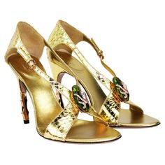 New Tom Ford for Gucci Gold Snake Sandals. S/S 2004 Collection Designer size 9.5 B ( Italian 39.5 ) Malachite Green color jeweled snake head. The heel features two inches of rose gold toned bamboo. Heel height - 4.5 inches. Made in Italy New with dust bag. Gold Sandals Heels, Tom Ford For Gucci, Gold High Heel Sandals, Green High Heels, Snake Heels, Carolyn Murphy, Malachite Green, Gucci Sandals, Jeweled Shoes