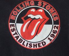 the rolling stones logo is shown on a black and white background, with red lettering