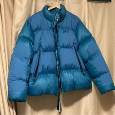 New With Tag Grey White Down Filling Functional Blue Puffer Jacket For Outdoor, Blue Functional Puffer Jacket For Outdoor, Outdoor Blue Down Puffer Jacket, Blue Hooded Functional Puffer Jacket, Blue Down Puffer Jacket For Streetwear, Blue Puffer Jacket With Pockets For Outdoor, Functional Blue Puffer Jacket, Functional Blue Down Outerwear, Blue Functional Down Outerwear