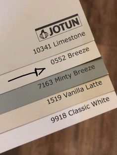 the label for jotun's new line of white and grey paint colors