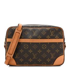 This is an authentic LOUIS VUITTON Monogram Trocadero 27. This shoulder bag is crafted of monogram coated canvas. The bag features avachetta leather shoulder strap and trim, gold hardware and an exterior flat pocket.The top zipper opens the bag to an interior of terra cotta cross-grain leather with a zipper pocket. Luxury Monogram Canvas Shoulder Bag With Detachable Strap, Luxury Monogram Canvas Crossbody Shoulder Bag, Business Monogram Canvas Crossbody Shoulder Bag, Luxury Monogram Canvas Tan Shoulder Bag, Luxury Monogram Canvas Shoulder Bag, Luxury Tan Monogram Canvas Shoulder Bag, Designer Monogram Canvas Shoulder Bag For Business, Tan Monogram Canvas Shoulder Bag With Detachable Strap, Formal Monogram Canvas Flap Shoulder Bag