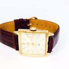 Classic Hamilton Watch Co. Lancaster, Pa. Vintage Wrist Watch is 14K Yellow Gold "Western Electric" 25 year employee service watch circa 1966. Engraved on back case #C65676 770 22 jewel mechanical movement. Case measures approximately 28mm minus the crown,  White colored dial with gold hashmarks,  Runs perfectly.  One Year Guarantee on Movement Only! 16.9 dwt.     Item Number: WOO9251 Vintage Yellow Gold Watch Accessories For Business, Retro Rectangular Watches For Formal Occasions, Retro Yellow Gold Watches For Formal Occasions, Vintage Watch Accessories With Polished Finish For Business, Vintage Watch Bands With Polished Finish For Business, Vintage Watches With Diamond Hour Markers For Formal Occasions, Retro Round Dial Watch For Formal Occasions, Retro Formal Watch Accessories With Subdials, Retro Automatic Watch Accessories For Formal Occasions