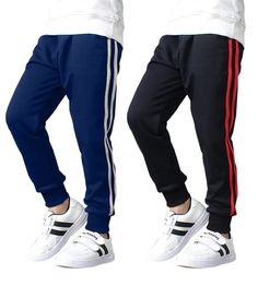 PRICES MAY VARY. One pack contains 2 pairs of boys jogger sweatpants.These jogging pants are very comfortable and can withstand your most intense activities. These jogger pants for boys made of 95% Cotton, 5% Spandex, The fabric is super-soft, breathable and stretchable,can machine or hand washable, won't fade after washing. Our sweatpants are very stylish.Designed with a range of vibrant colors, shapeyour little one will surely stand out from the crowd.Our sweatpants are also designed with adju Pants For Boys, Boys Joggers, Comfortable Outfit, Cotton Sweatpants, Jogging Pants, Jogger Sweatpants, Side Stripe, Stripes Design, Jogger Pants