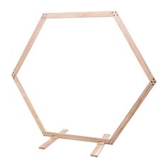 a wooden frame with two pieces of wood attached to the sides and one piece missing