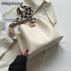 Shipping: Worldwide Express Shipping AvailableDelivery time: 🚚7-15Days Fast ShippingReturns: Fast refund,💯100% Money Back Guarantee.Brand Name: Jin YIdeHandbags Type: Shoulder BagsTypes of bags: Shoulder BagsMain Material: PUShape: BucketPlace Of Origin: HE BEI ProvincePlace Of Origin: HE BEI ProvinceOrigin: Mainland ChinaCN: HebeiHardness: SOFTPattern Type: SolidInterior: Interior Zipper PocketInterior: Interior CompartmentDecoration: NONEExterior: NONEOccasion: VersatileClosure Type: No zipp Trendy Beige Bucket Bag With Single Shoulder Strap, Trendy Beige Bucket Bag, Trendy Cream Shoulder Bag With Large Capacity, Trendy Large Capacity Cream Shoulder Bag, Trendy Cream Shoulder Bag, Trendy Cream Office Bag, Trendy Cream Shoulder Bag With Single Strap, White Bags For Fall Shopping, Trendy Cream Bucket Bag For Shopping