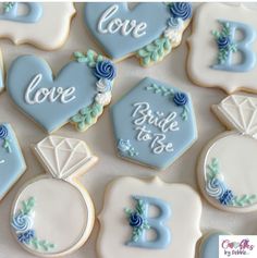 decorated cookies are arranged in the shape of hearts