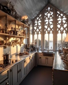 a kitchen with lots of windows and cabinets