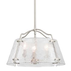 a light fixture with three lights hanging from it's ceiling and glass shades on the bottom