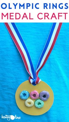 a medal with donuts on it and the words olympic rings medal craft written below