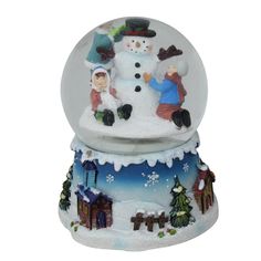 a snow globe with two people and a snowman on it's top, in front of a white background