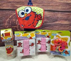 the elmo and elmo lunch bags are on display in front of some other items