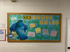 a bulletin board with the words on house rules written in front of it and an image of a monster holding a book